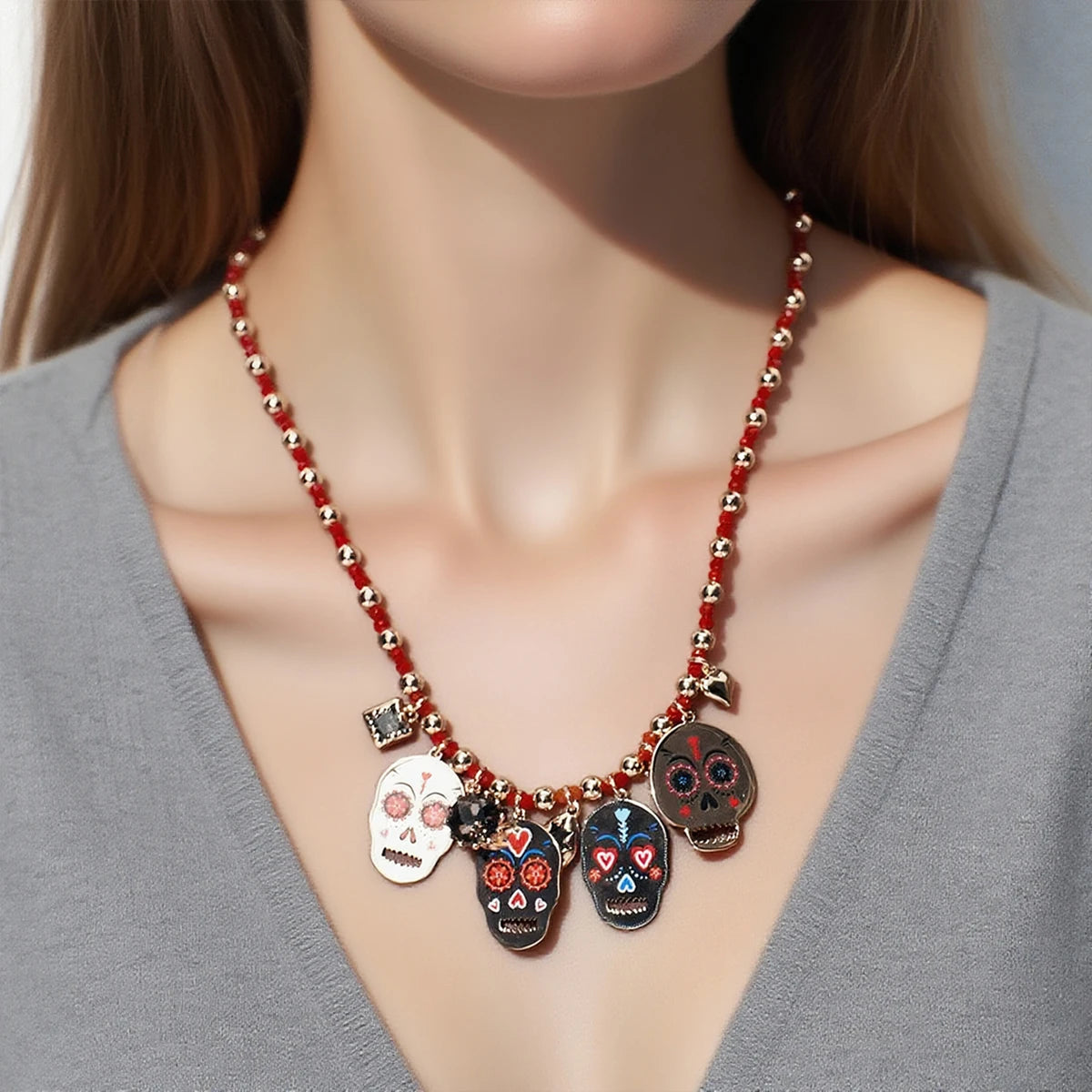 Doodad Co. Rhinestone Skull Drop Earrings — Vintage Halloween Statement Jewelry
