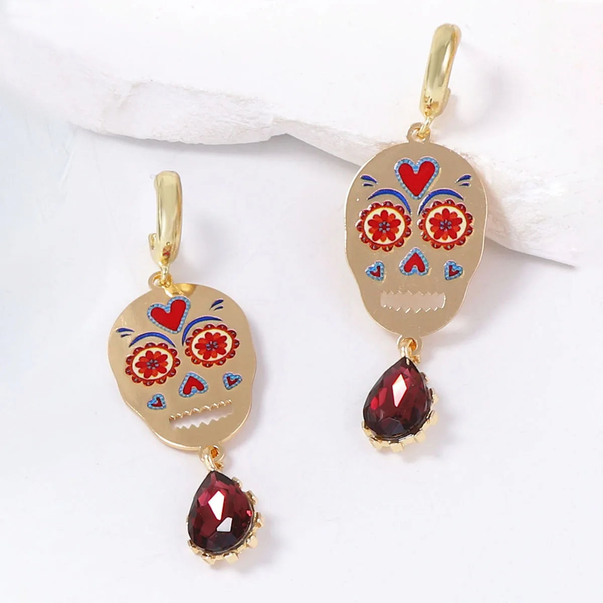 Doodad Co. Rhinestone Skull Drop Earrings — Vintage Halloween Statement Jewelry