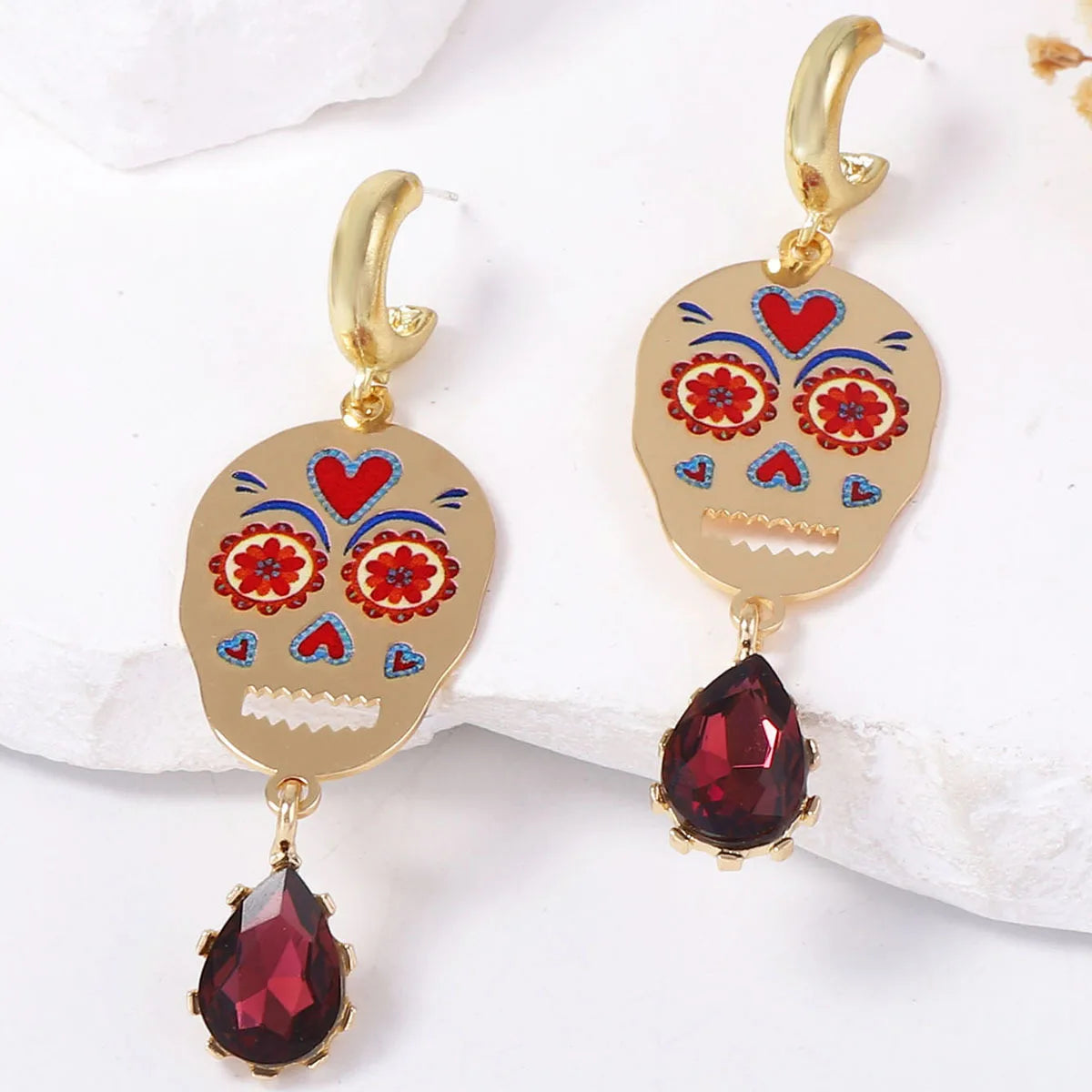 Doodad Co. Rhinestone Skull Drop Earrings — Vintage Halloween Statement Jewelry