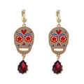 Doodad Co. Rhinestone Skull Drop Earrings — Vintage Halloween Statement Jewelry